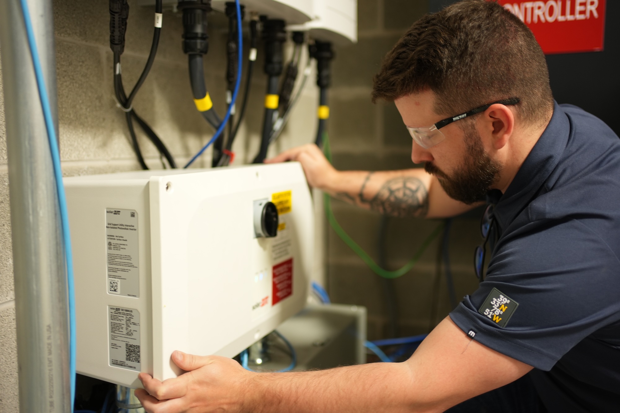 Marshall working on a inverter box