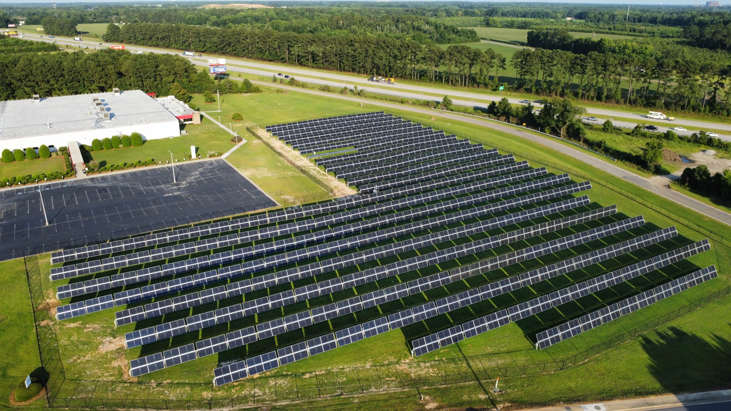 Aerial view of American Woodmark Allegany facility with new rooftop solar panel system